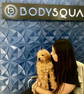 bodysculpting specialist Alexa and Dog at BodySquad in Florida